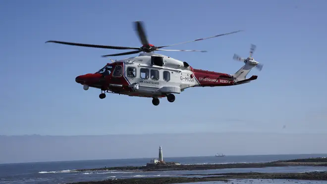 A Coastguard helicopter winched the man from the sea