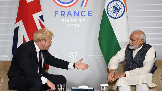File photo of Boris Johnson meeting Narendra Modi at the 2019 G7 Summit in France