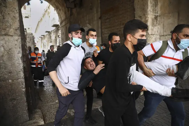 Dozens of Palestinians have been taken to hospital after clashes in Jerusalem