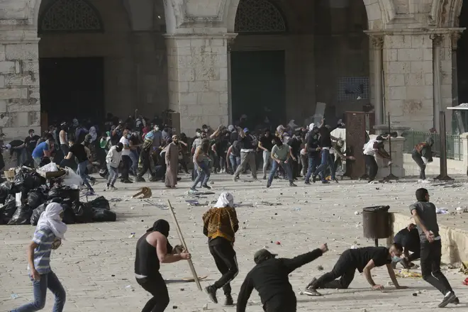 Palestinians clash with Israeli security forces at the Al Aqsa Mosque compound