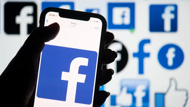 The Facebook logo on a smartphone
