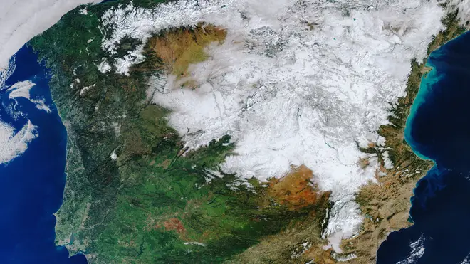 Sentinel-3 satellite image shows an unusual and rare blanket of snow covering a large swathe of Spain, including its capital Madrid, during a cold snap in January 2021 (ESA/PA)