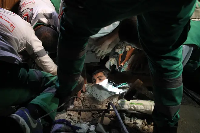 Rescuers are racing to pull people from the rubble in Gaza after Israeli air strikes.
