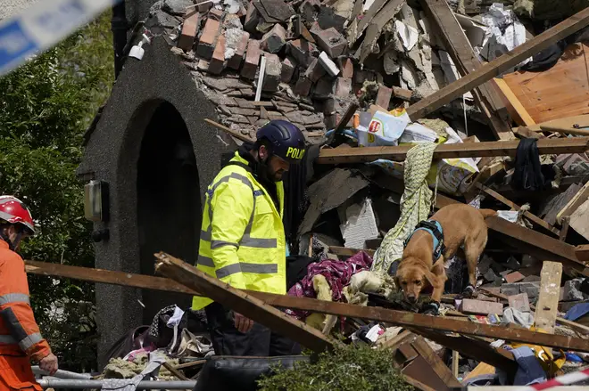 Emergency workers picked through the rubble with sniffer dogs on Sunday morning.