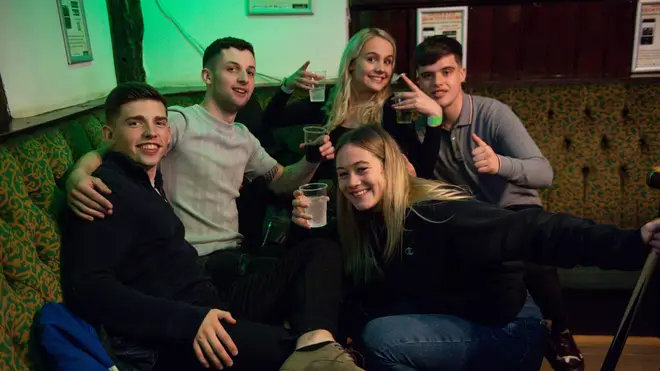 A group pose for a photo inside a pub in Coventry