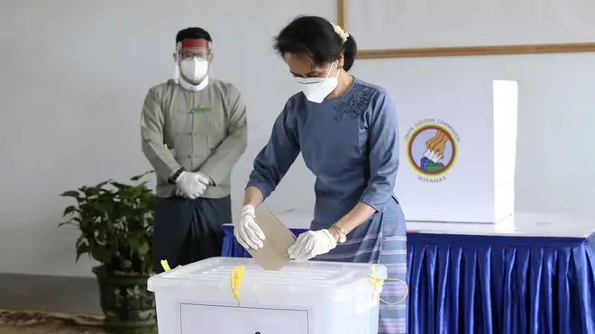 Aung San Suu Kyi casts her ballot in last year's election