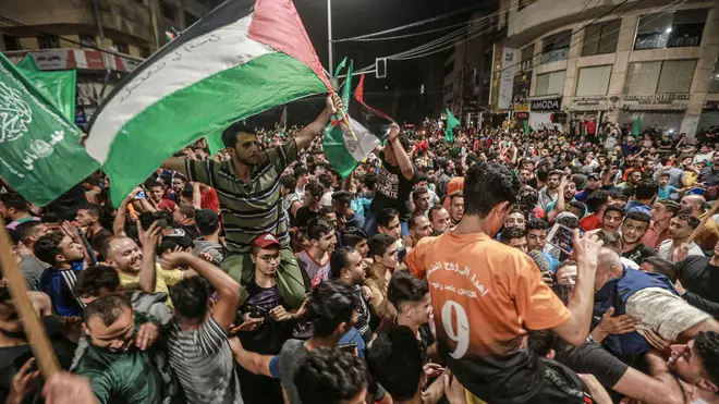Palestinians celebrated the ceasfire in the Gaza Strip and the West Bank