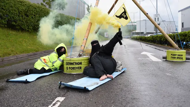 A McDonald's distribution centre has been blocked by Animal Rights protester