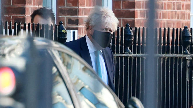 Boris Johnson pictured leaving No10 earlier today