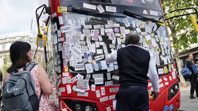 Protesters placed stickers all over the bus near Trafalgar Square