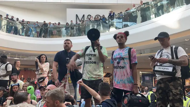 Anti-vaxxers clashed with police but were removed from Westfield shortly after