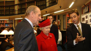 The Queen and Prince Philip visiting the Maughan Library at King's College London in 2002.