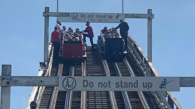 Riders were rescued after the Grand National rollercoaster failed part way up a slope