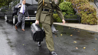 A White House military aide carries the nuclear football