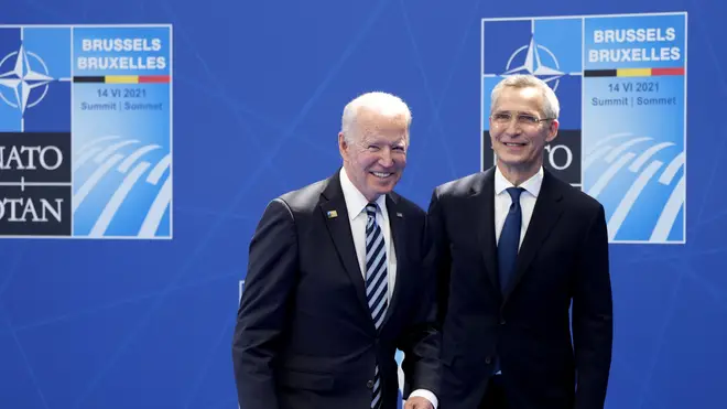 US President Joe Biden is welcomed by Nato secretary general Jens Stoltenberg