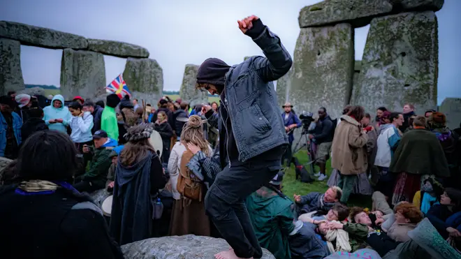 People inside the stone circle during Summer Solstice at Stonehenge