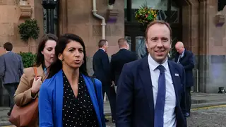 Matt Hancock walking with Gina Coladangelo during the 2019 Tory Party conference