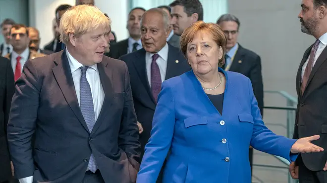 Boris Johnson and Angela Merkel will hold crunch talks on coronavirus travel restrictions between the UK and Germany