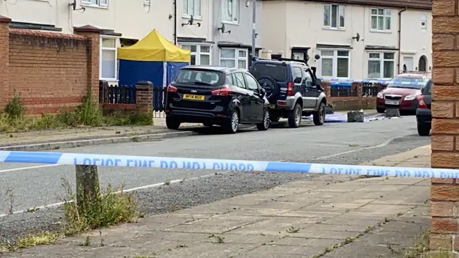 A man has been shot dead in a residential area on Merseyside