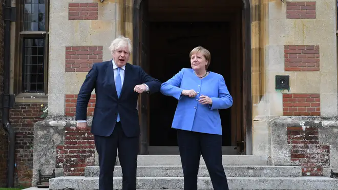 The German Chancellor was welcomed by the Prime Minister with an elbow bump.
