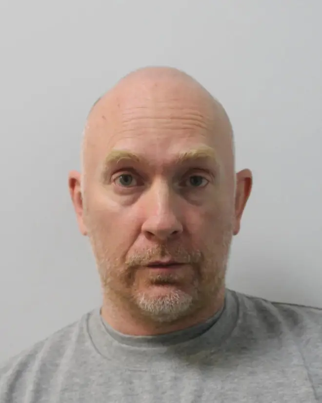 Custody photo of former Met Police officer Wayne Couzens