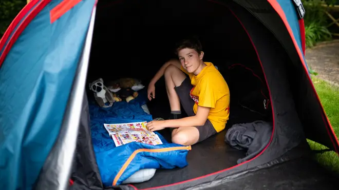 Max has been camping outside for more than a year to raise awareness of vulnerable children