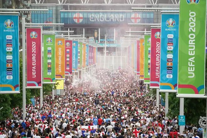 Huge crowds line Wembley Way ahead of the 8pm kickoff.