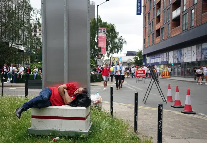 An England fan takes knap ahead of the big game.