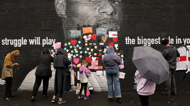 Fans gathered at the mural to share positive messages.
