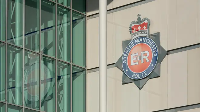 An officer serving with Greater Manchester Police has been charged with a number of offences