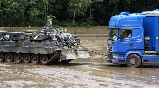 German tanks have been brought in to clear stranded vehicles.