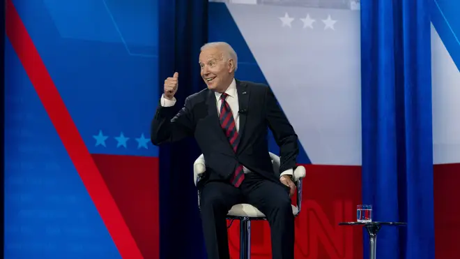 President Joe Biden interacts with members of the audience during a commercial break for a CNN town hall at Mount St Joseph University in Cincinnati