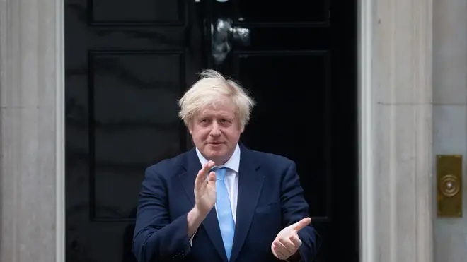 Boris Johnson claps for the NHS in the first national lockdown in 2020