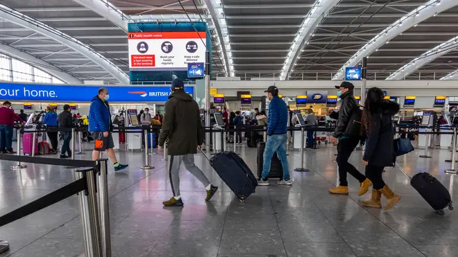 File photo of Heathrow Airport showing a busier check-in desk