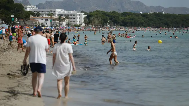 Holidaymakers enjoy the sun in Spain