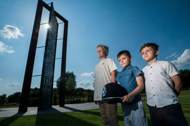 Harvey, Riley and Reggie in front of the new UK Police Memorial