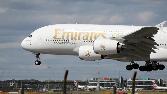 A Emirates Airbus A380 plane lands at Heathrow Airport