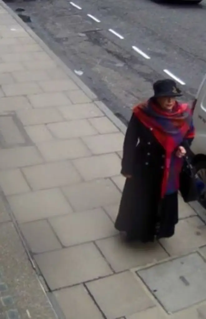 Lakatos disguised herself in a long dark coat, brimmed hat and long scarf