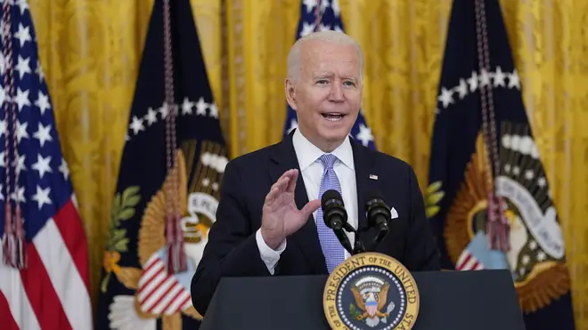 President Joe Biden speaks in the East Room of the White House in Washington