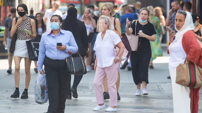 People wearing masks outdoors