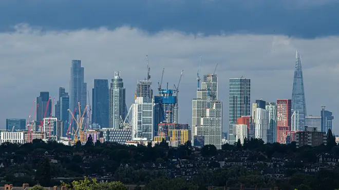 Ominous grey skies were pictured looming over London on Friday evening