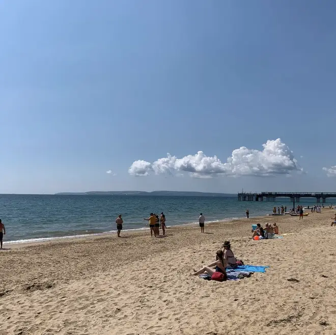 The beach at Boscombe after the sea was evacuated following a possible 'shark sighting'