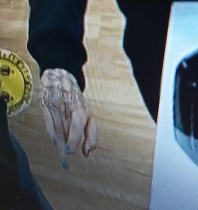 Police shared a picture of the suspect's distinctive hand tattoo