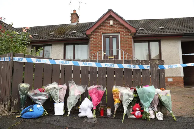 Two people have been charged over the death of the two-year-old girl