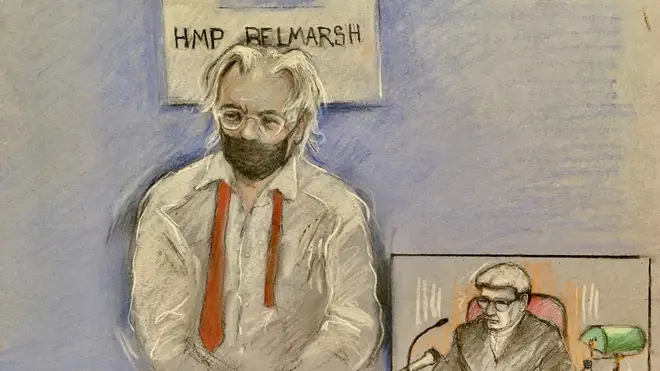 A court sketch of Assange who appeared by video link