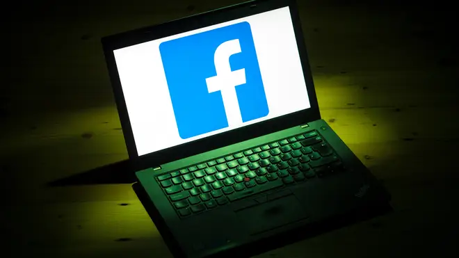 Facebook logo on laptop