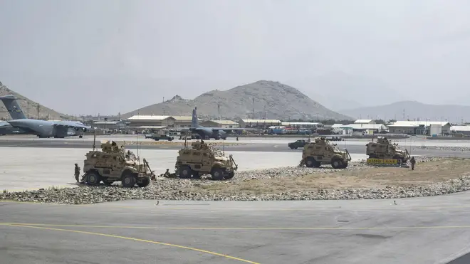 International troops including British and American forces have secured the airport