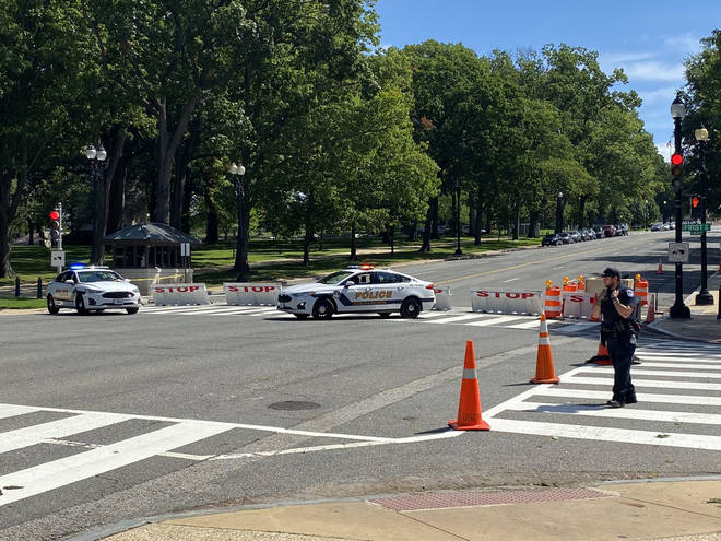 Police at the scene of the active bomb scare at the US Capitol, near the Library of Congress.