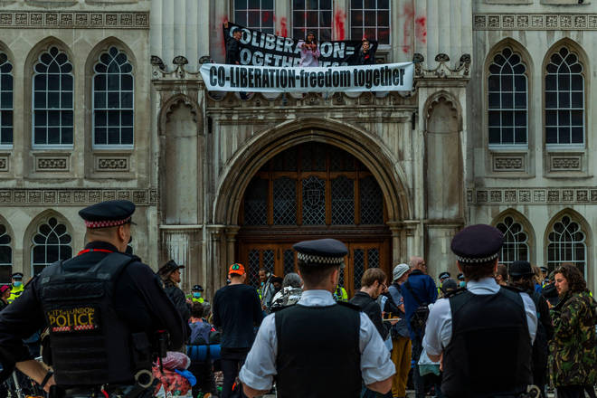 Protesters climbed the Guildhall in London ahead of two weeks of protests in the capital