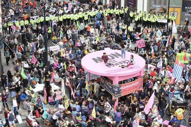 Extinction Rebellion protesters block streets in central London